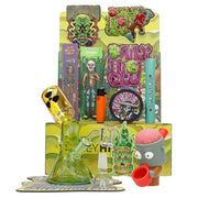Front view of the “Radioactive Wasteland” Smoking Box, featuring a green, cartoonish design with a red accent on a patterned surface.